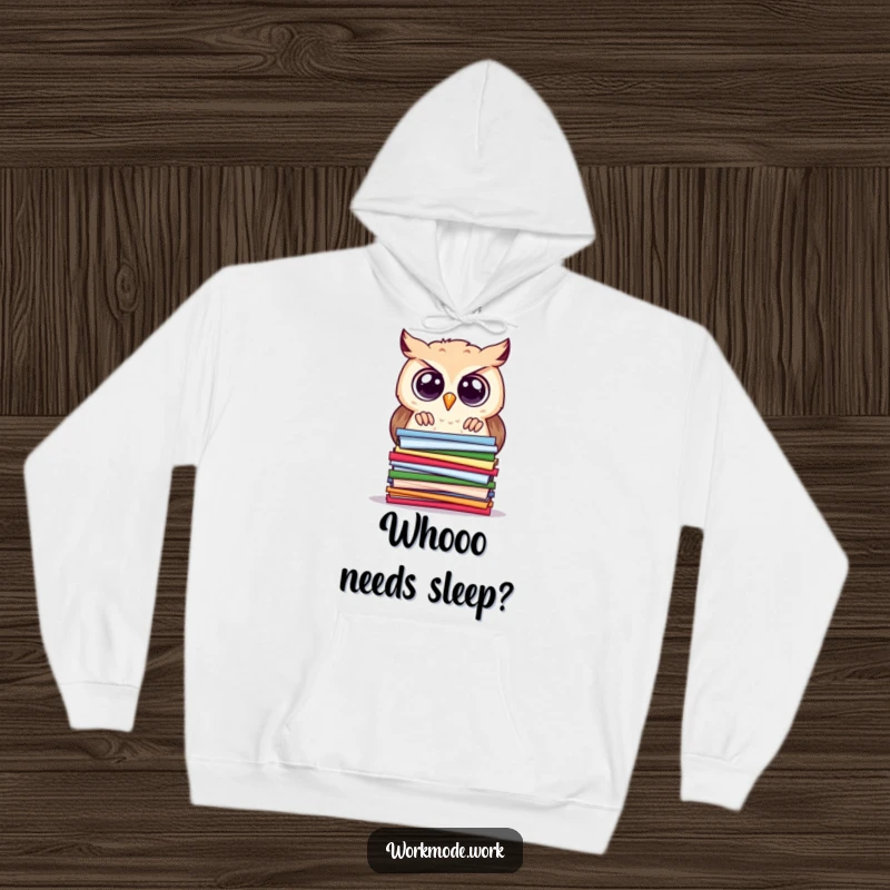 Funny owl hoodie showing a curious owl with wide eyes, peering intently at a stacked pile of colorful papers, for study.